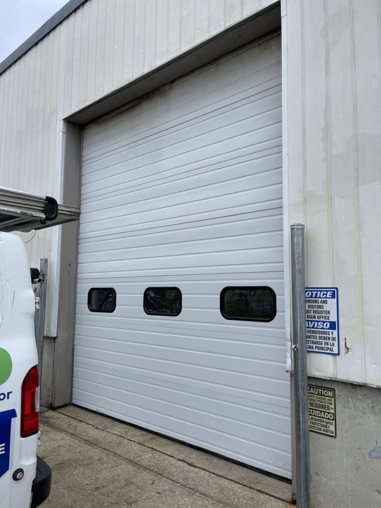 commercial overhead door spring repair near you